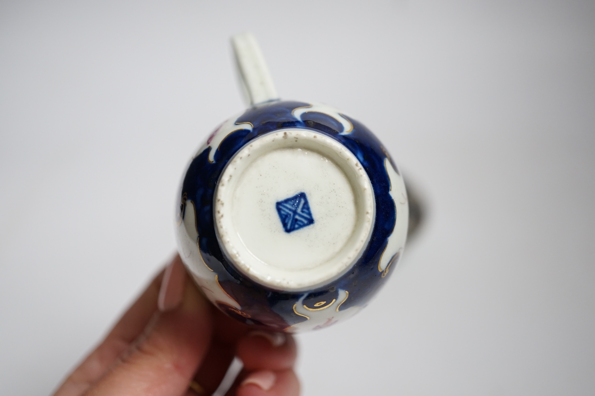 A Worcester scale blue cup and saucer, c.1775